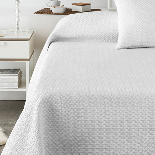 Colcha blanca lisa jacquard: Comodidad, durabilidad y estilo para tu dormitorio.