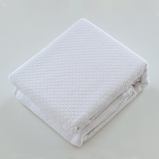 Colcha blanca lisa jacquard: Comodidad, durabilidad y estilo para tu dormitorio.