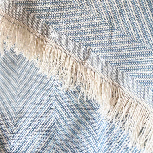 Multipurpose bedspread for sofa or bed with fringes. Beige and Ecru color.