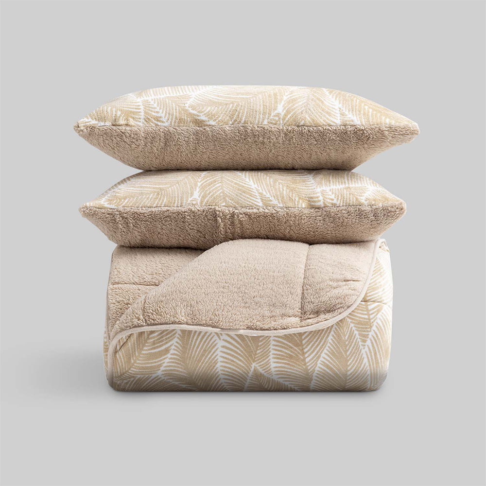 Warm sherpa winter duvet with beige leaf print.