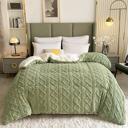 Green winter blanket quilt. Embrace the warmth at every break.