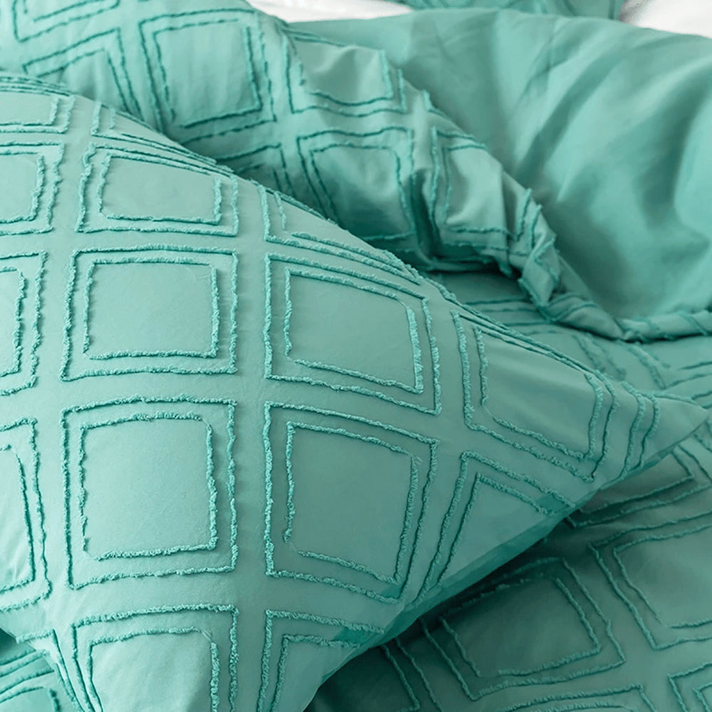 Turquoise duvet cover with embossed rhombuses, modern and extra soft.