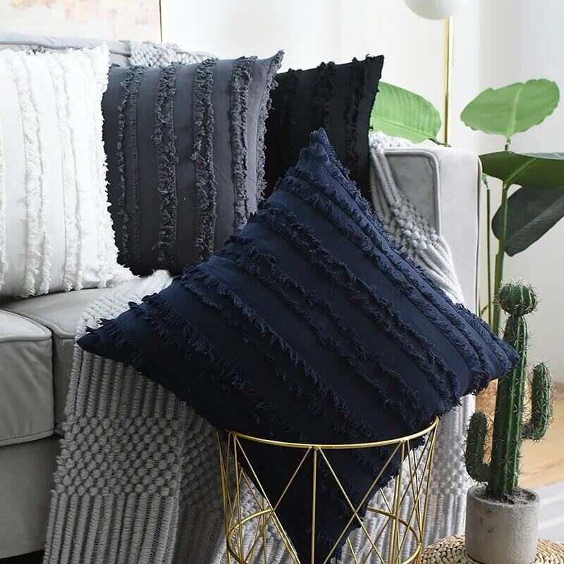 Funda de cojín con franjas de flecos azul marino navy, algodón y lino.