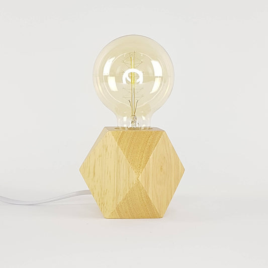 Bedside table lamp with light bulb. Wood with diamond base.