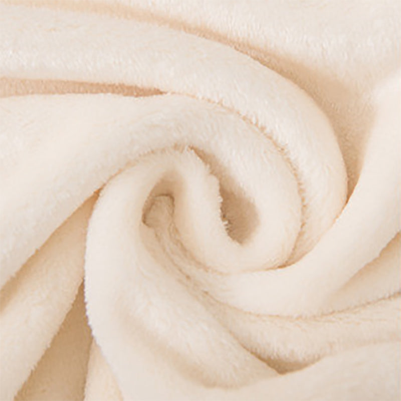 Manta polar suave. Color crema.