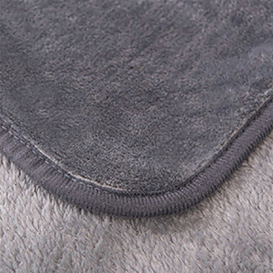Manta polar suave. Color gris.